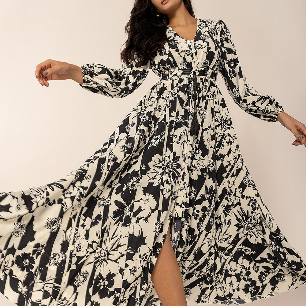 
                  
                    Tied Printed V-Neck Long Sleeve Midi Dress
                  
                