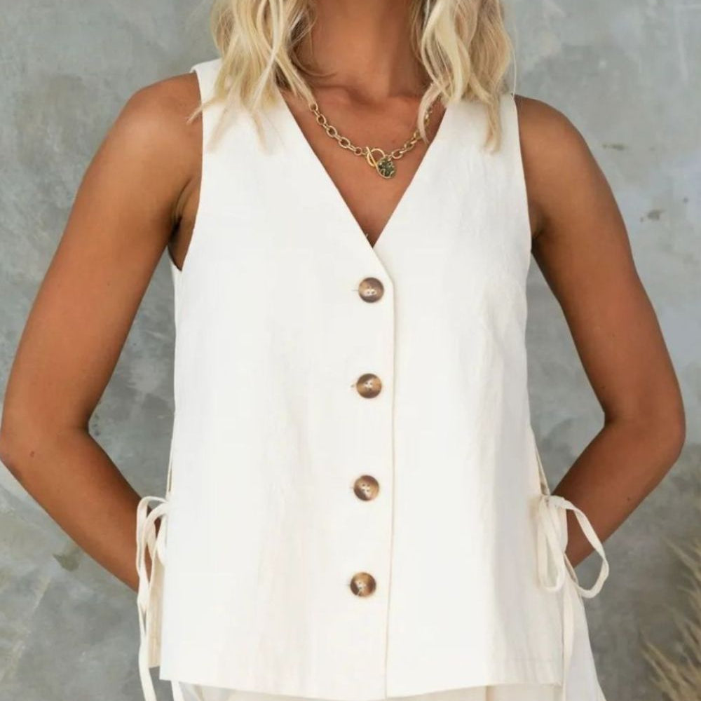 
                      
                        Tied V-Neck Sleeveless Top and Pants Set
                      
                    